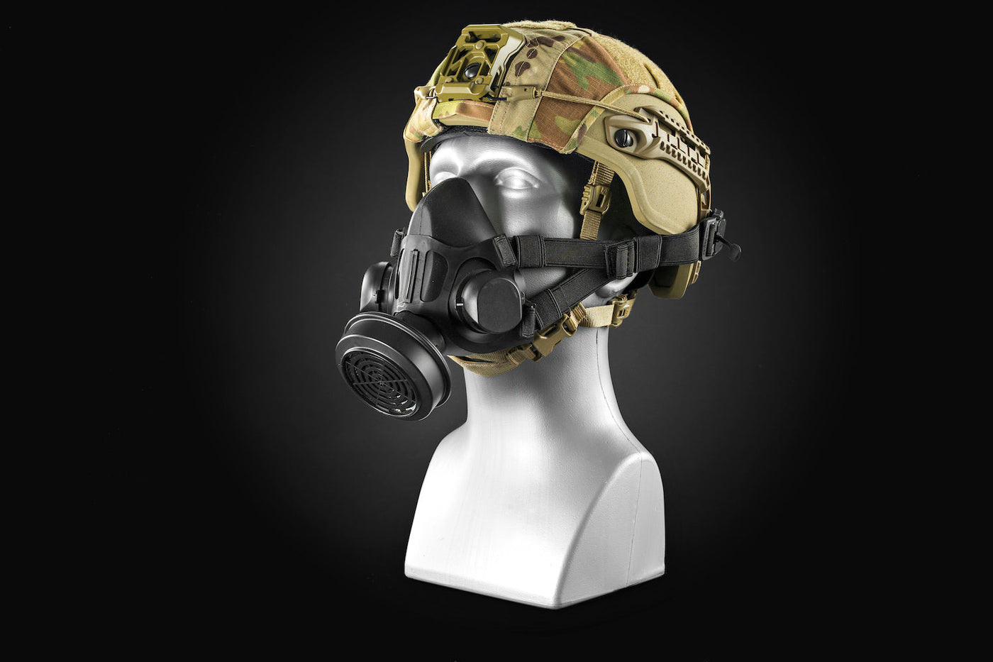Three quarter profile of the Tactical Air-Purifying Respirator mask (TAPR) with the ARC Rail Fidlock Connectors